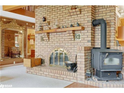 2396 Lakeshore Drive, Brechin, ON - Indoor Photo Showing Living Room With Fireplace