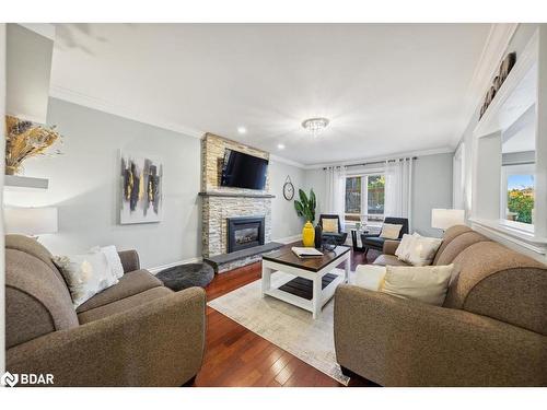 26 Doon Crescent, Keswick, ON - Indoor Photo Showing Living Room With Fireplace