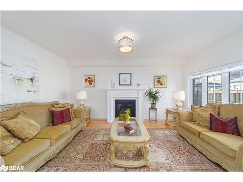 1002 Larter Street, Innisfil, ON - Indoor Photo Showing Living Room With Fireplace