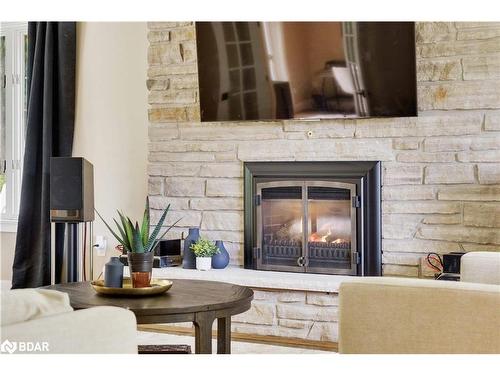 11 Park Trail, Midhurst, ON - Indoor Photo Showing Living Room With Fireplace