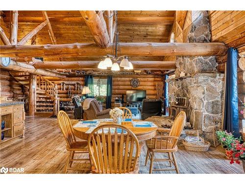 622423 Sideroad 7, Chatsworth, ON - Indoor Photo Showing Dining Room With Fireplace