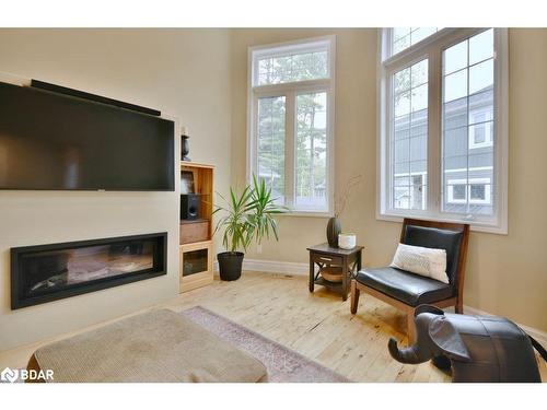 25 Laidlaw Street, Wasaga Beach, ON - Indoor Photo Showing Living Room With Fireplace