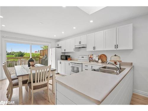 105 Wessenger Drive, Barrie, ON - Indoor Photo Showing Kitchen With Double Sink