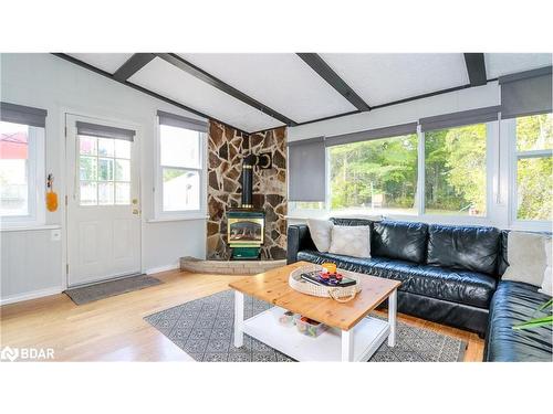 2208 Willard Avenue, Innisfil, ON - Indoor Photo Showing Living Room With Fireplace