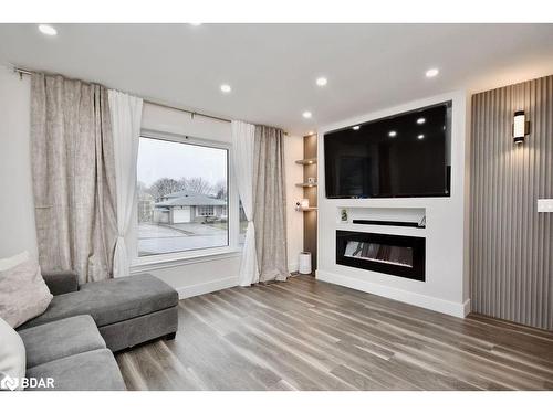 72 Jane Crescent, Barrie, ON - Indoor Photo Showing Living Room With Fireplace