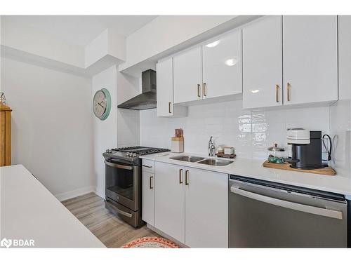 104-10 Culinary Lane, Barrie, ON - Indoor Photo Showing Kitchen With Double Sink With Upgraded Kitchen