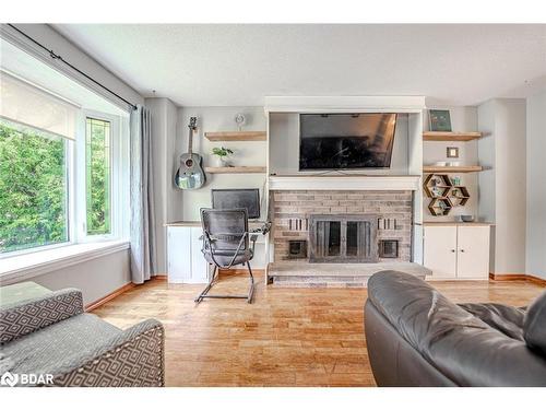 9 Oriole Court, Barrie, ON - Indoor Photo Showing Living Room With Fireplace