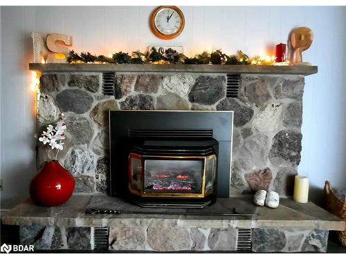 319203 Grey Road 1, Georgian Bluffs, ON - Indoor Photo Showing Living Room With Fireplace