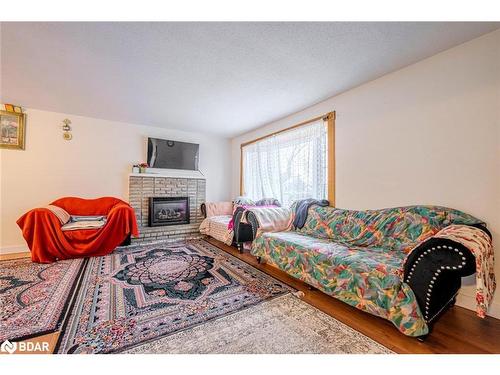 203 Phillips Street, Barrie, ON - Indoor Photo Showing Living Room With Fireplace