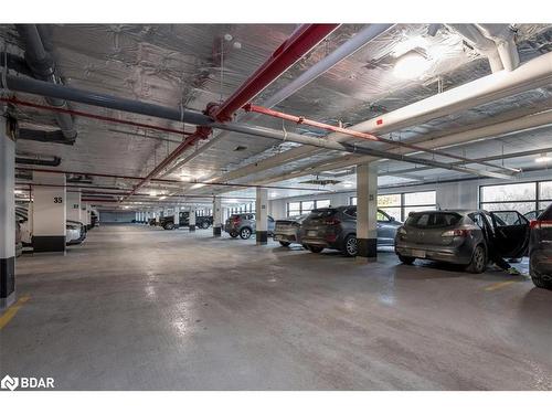 714-185 Dunlop Street East Street E, Barrie, ON - Indoor Photo Showing Garage