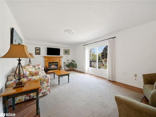 73 Carter Cres Crescent, Orillia, ON - Indoor Photo Showing Living Room With Fireplace