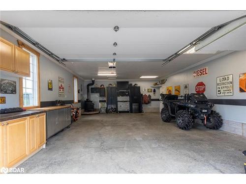 14308 County 27 Road, Springwater, ON - Indoor Photo Showing Garage