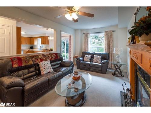 56 Stoneybrook Crescent, Barrie, ON - Indoor Photo Showing Living Room With Fireplace