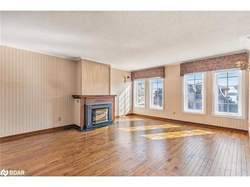 36 Kempenfelt Drive, Barrie, ON - Indoor Photo Showing Living Room With Fireplace