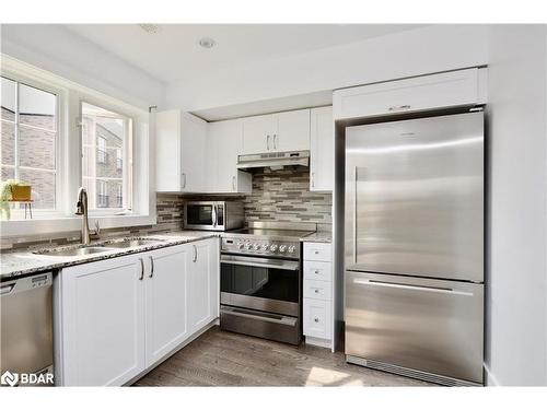 6-51 Ferndale Drive S, Barrie, ON - Indoor Photo Showing Kitchen With Double Sink