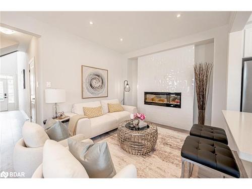 113 Sagewood Avenue, Barrie, ON - Indoor Photo Showing Living Room With Fireplace