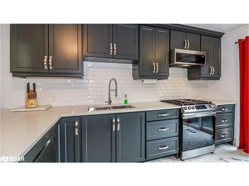 99 Leggott Avenue, Barrie, ON - Indoor Photo Showing Kitchen With Double Sink With Upgraded Kitchen