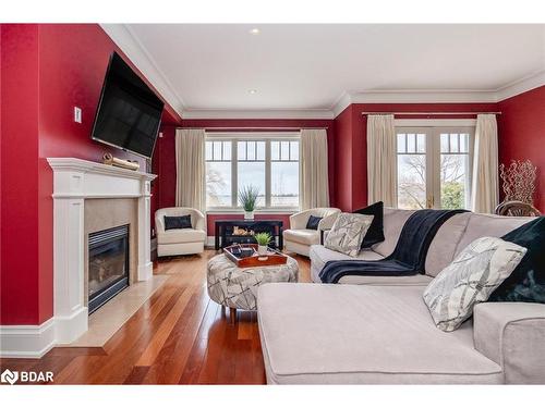 701-40 Trott Boulevard, Collingwood, ON - Indoor Photo Showing Living Room With Fireplace