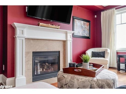 701-40 Trott Boulevard, Collingwood, ON - Indoor Photo Showing Living Room With Fireplace