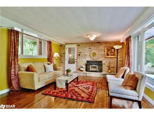 1359 St Vincent St Street, Springwater, ON - Indoor Photo Showing Living Room With Fireplace