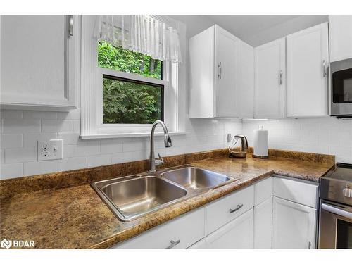 314 Riverside Drive, Bobcaygeon, ON - Indoor Photo Showing Kitchen With Double Sink