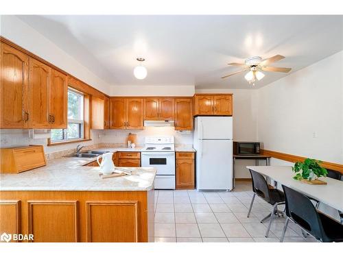 84 Wendake Road, Tiny, ON - Indoor Photo Showing Kitchen With Double Sink