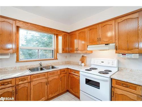 84 Wendake Road, Tiny, ON - Indoor Photo Showing Kitchen With Double Sink