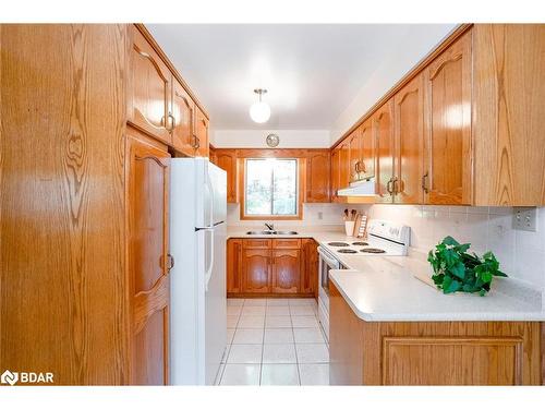 84 Wendake Road, Tiny, ON - Indoor Photo Showing Kitchen With Double Sink