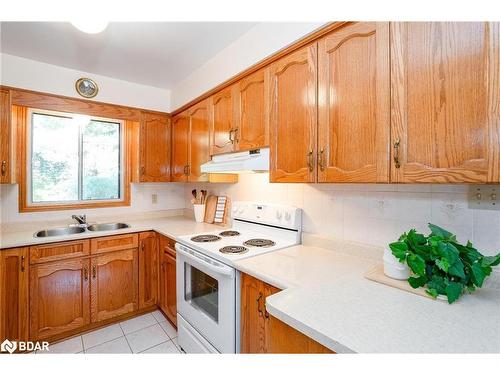 84 Wendake Road, Tiny, ON - Indoor Photo Showing Kitchen With Double Sink