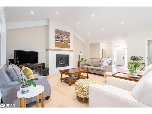 14 Glenn Howard Court, Tiny, ON - Indoor Photo Showing Living Room With Fireplace