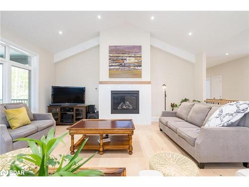 14 Glenn Howard Court, Tiny, ON - Indoor Photo Showing Living Room With Fireplace