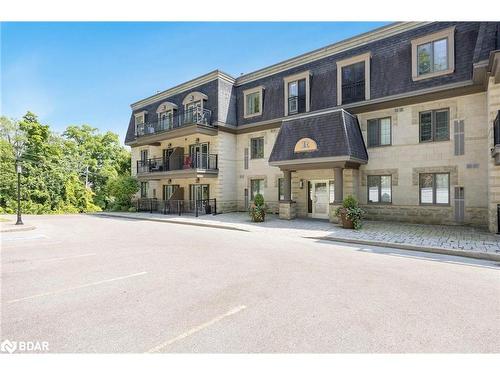 401-200 Collier Street, Barrie, ON - Outdoor With Facade