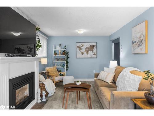 39 Corbett Drive, Barrie, ON - Indoor Photo Showing Living Room With Fireplace