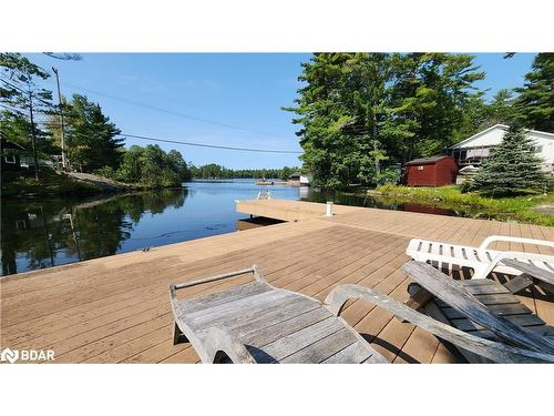 4372 Conners Bay Lane, Coldwater, ON - Outdoor With Body Of Water With Deck Patio Veranda