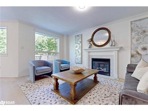 30 Ambler Bay, Barrie, ON - Indoor Photo Showing Living Room With Fireplace