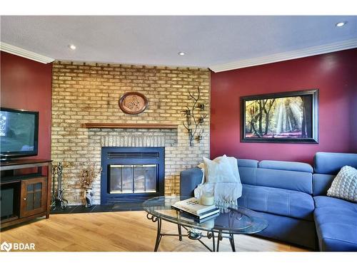 2094 Fennell Dr, Innisfil, ON - Indoor Photo Showing Living Room With Fireplace