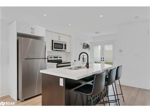 21 Fairlane Avenue, Barrie, ON - Indoor Photo Showing Kitchen With Stainless Steel Kitchen With Double Sink With Upgraded Kitchen