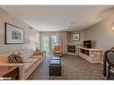 2220-2221-90 Highland Drive, Oro-Medonte, ON  - Indoor Photo Showing Living Room With Fireplace 