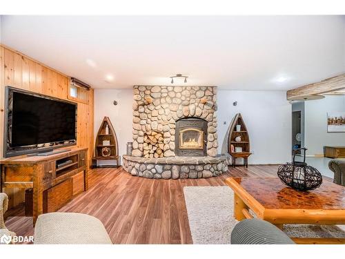 697 Lafontaine Road E, Tiny, ON - Indoor Photo Showing Living Room With Fireplace