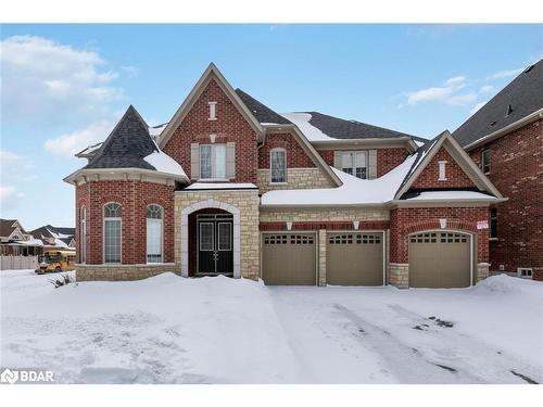 23 Mcisaac Drive, Springwater, ON - Outdoor With Facade