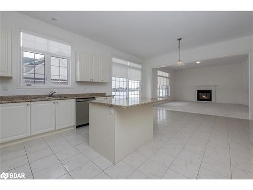 23 Mcisaac Drive, Springwater, ON - Indoor Photo Showing Kitchen