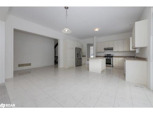 23 Mcisaac Drive, Springwater, ON - Indoor Photo Showing Kitchen