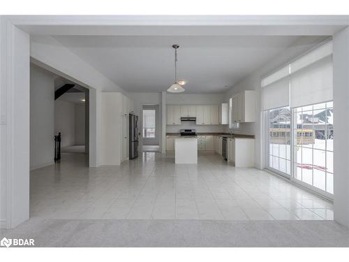 23 Mcisaac Drive, Springwater, ON - Indoor Photo Showing Kitchen