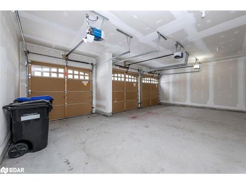 23 Mcisaac Drive, Springwater, ON - Indoor Photo Showing Garage