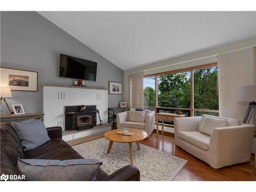 8 Pine Spring Road, Horseshoe Valley, ON - Indoor Photo Showing Living Room With Fireplace