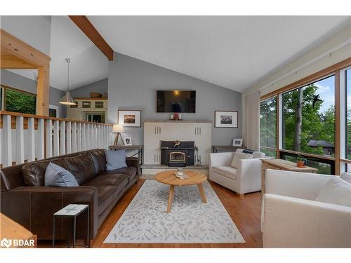 8 Pine Spring Road, Horseshoe Valley, ON - Indoor Photo Showing Living Room With Fireplace