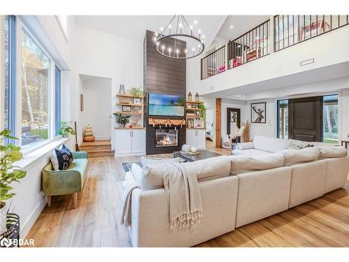 1025 Davis Drive, Gravenhurst, ON - Indoor Photo Showing Other Room With Fireplace