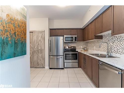 210-44 Ferndale Drive S, Barrie, ON - Indoor Photo Showing Kitchen With Double Sink