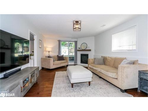 99 Churchland Drive, Barrie, ON - Indoor Photo Showing Living Room With Fireplace