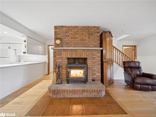 74 Line 15 N, Oro-Medonte, ON - Indoor Photo Showing Living Room With Fireplace